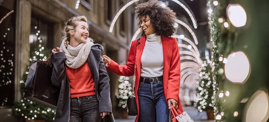 Young Women Christmas Shopping