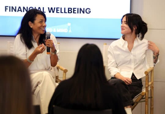 Senior Director of Growth and Partnerships for First Entertainment Credit Union Meyoung Spektor speaking with content creator and best-selling author Kyla Scanlon at the Hollywood & Mind Summit