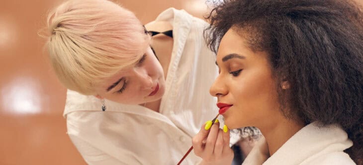 Professional makeup performed in modern beauty studio