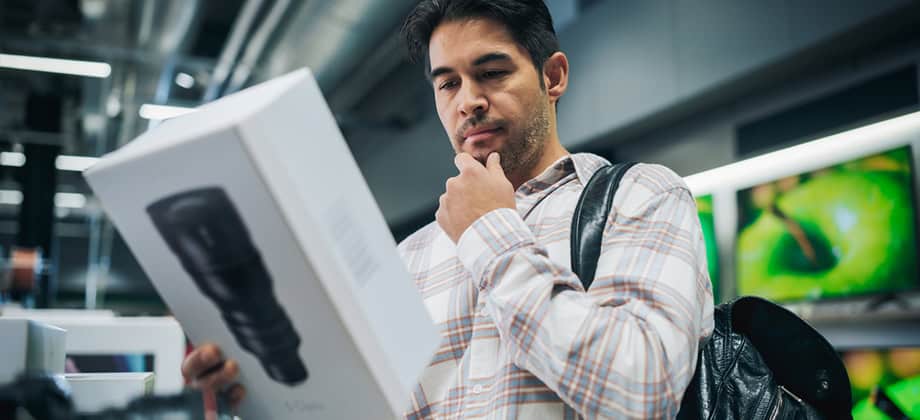 Man shopping for camera equipment